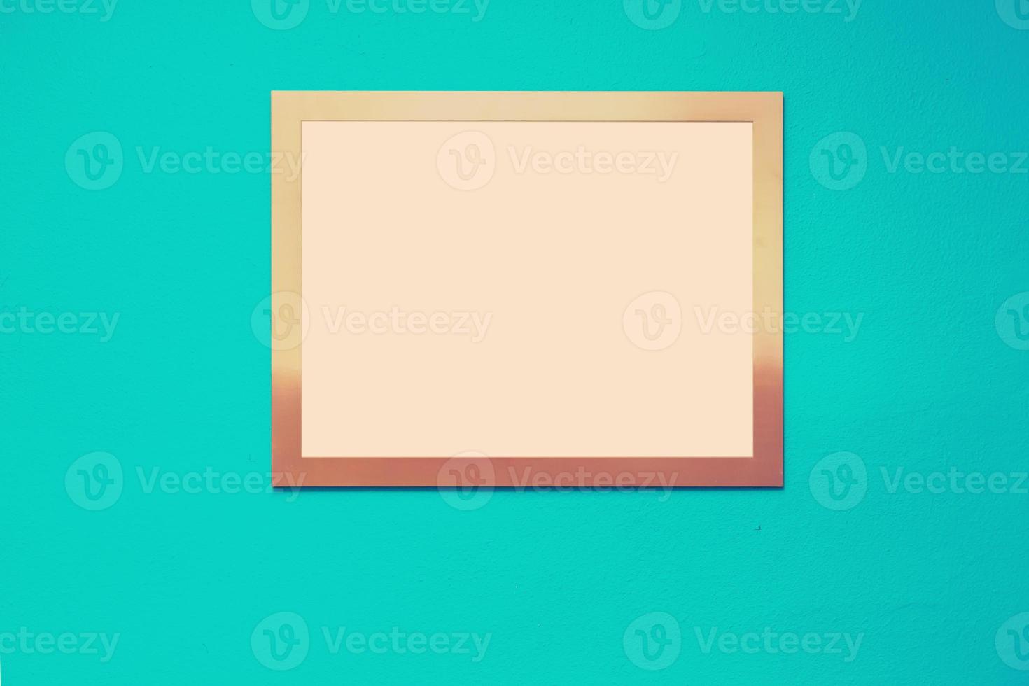 Empty picture frame on a bright solid background photo