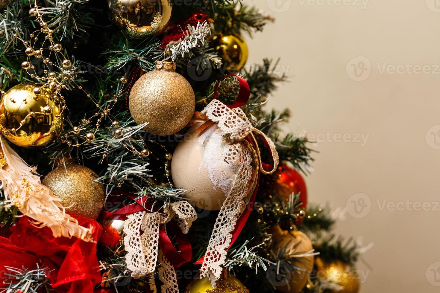 Christmas tree background and Christmas decorations with snow, blurred, sparking, glowing. Happy New Year and Xmas theme photo