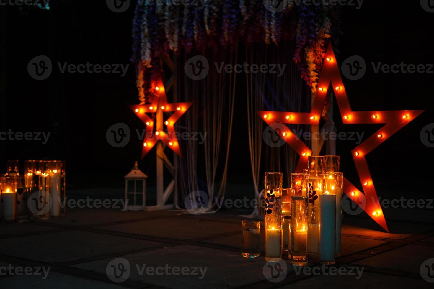 Decorative star with lamps on a background of wall. Modern grungy interior photo