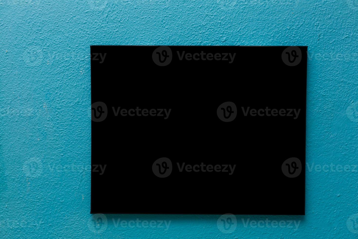 Empty picture frame on a bright solid background photo