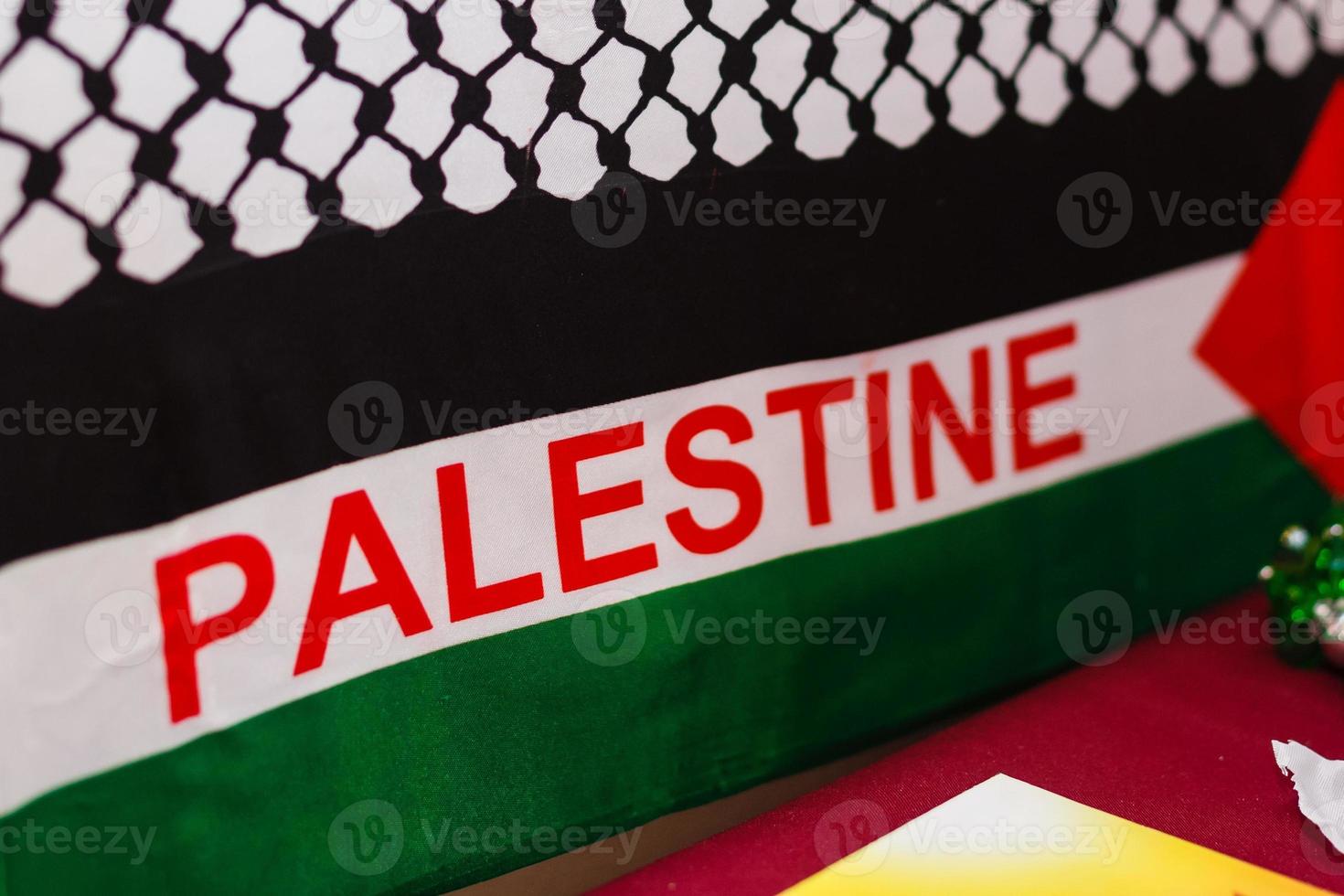 Realistic flag of palestine on the wavy surface of fabric this flag can be used in design photo