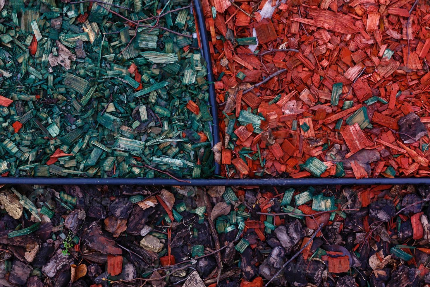 Bark in a flowerbed in landscape design photo
