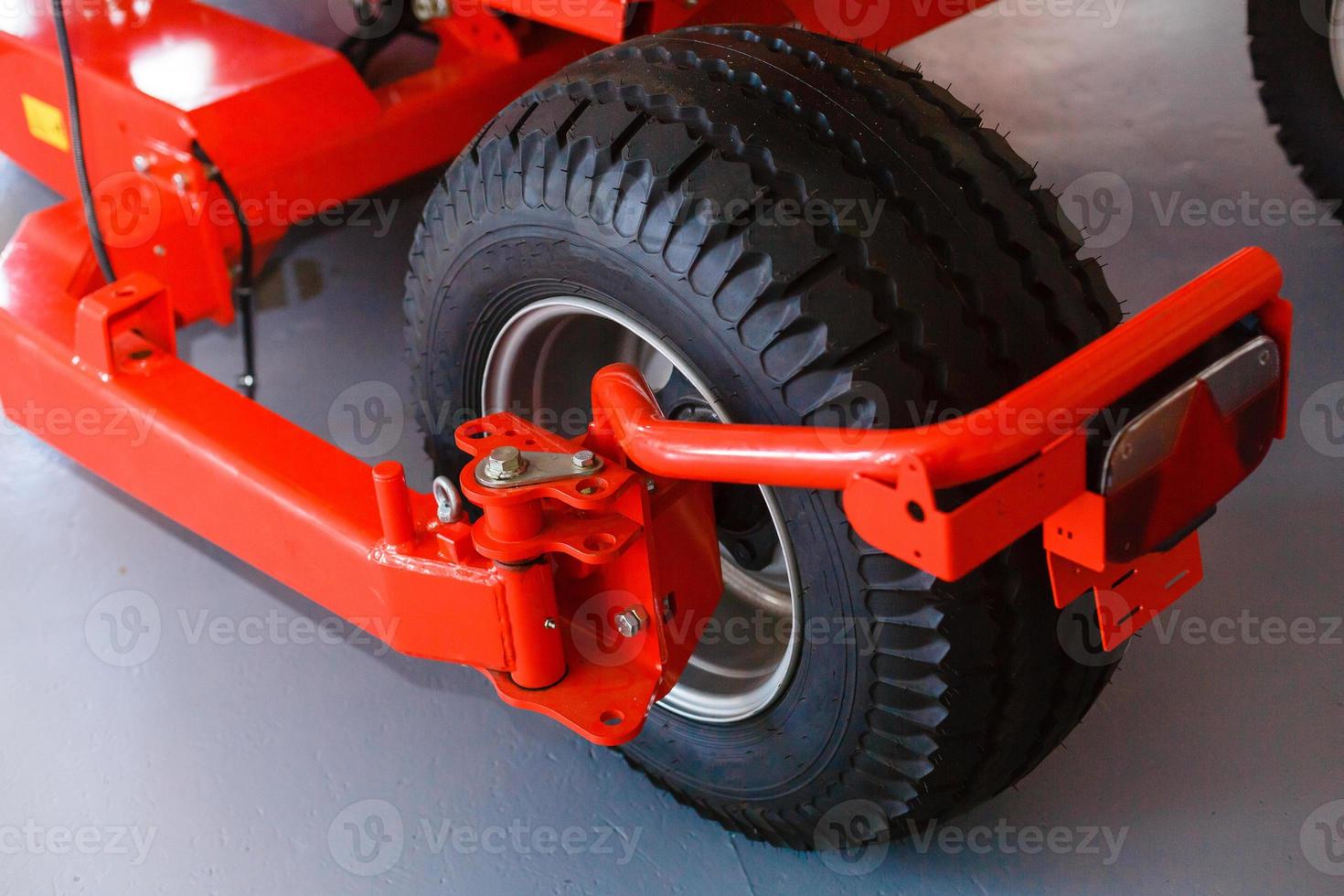 Rear view of modern agricultural tractor hydraulic hitch lifting frame rear mechanism for photo