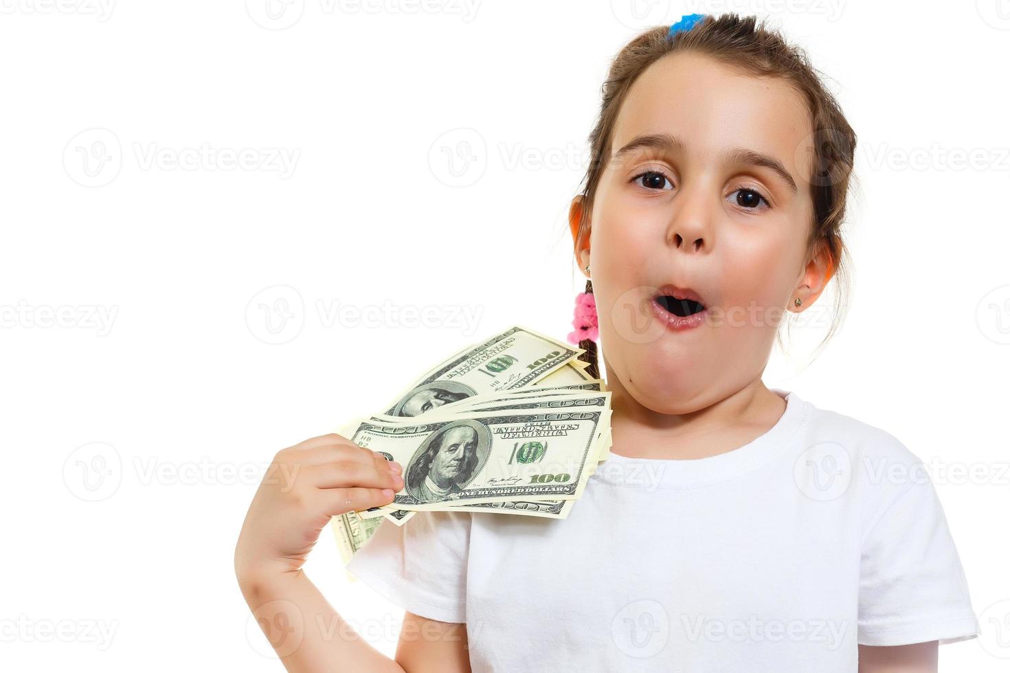 Cute girl holding money photo