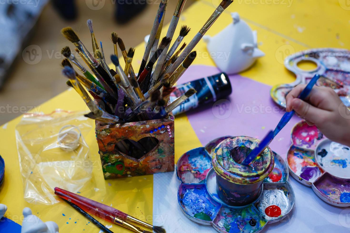 Paints and brushes, brush artist photo