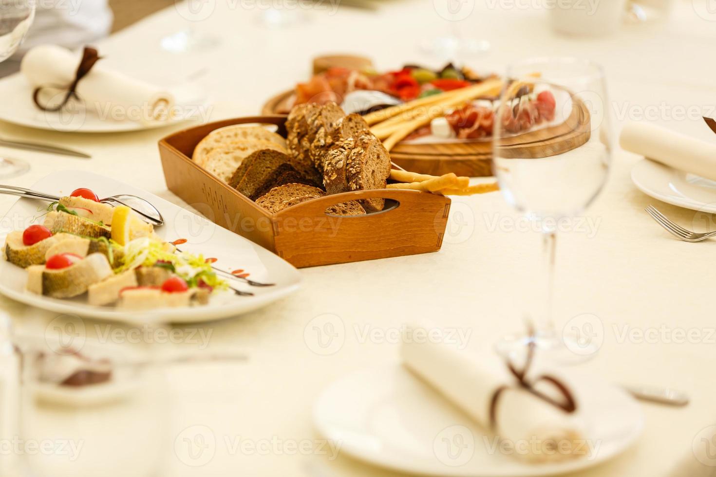 catering services background with snacks and glasses on bartender counter in restaurant photo