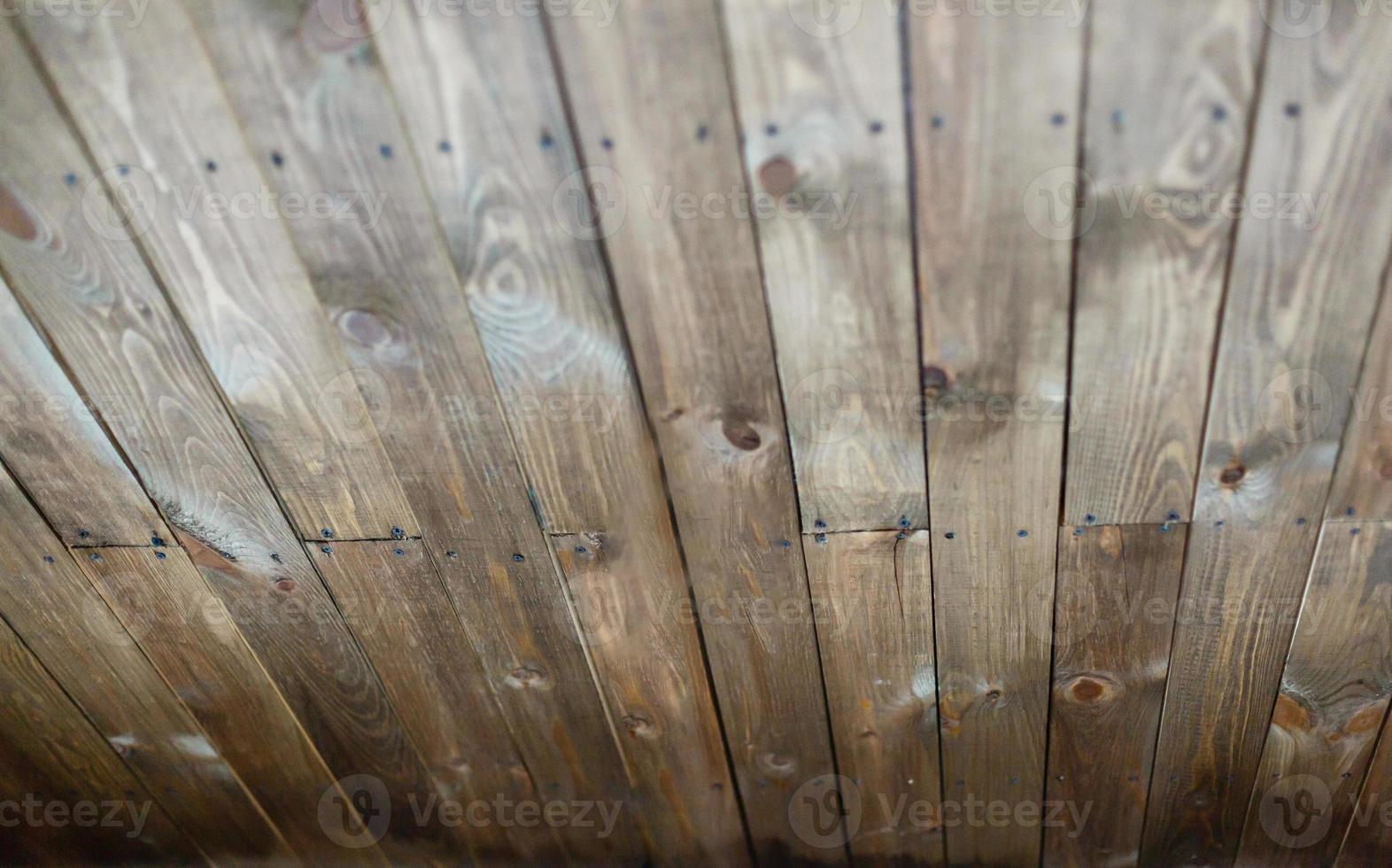 ceiling fan on a wooden ceiling photo