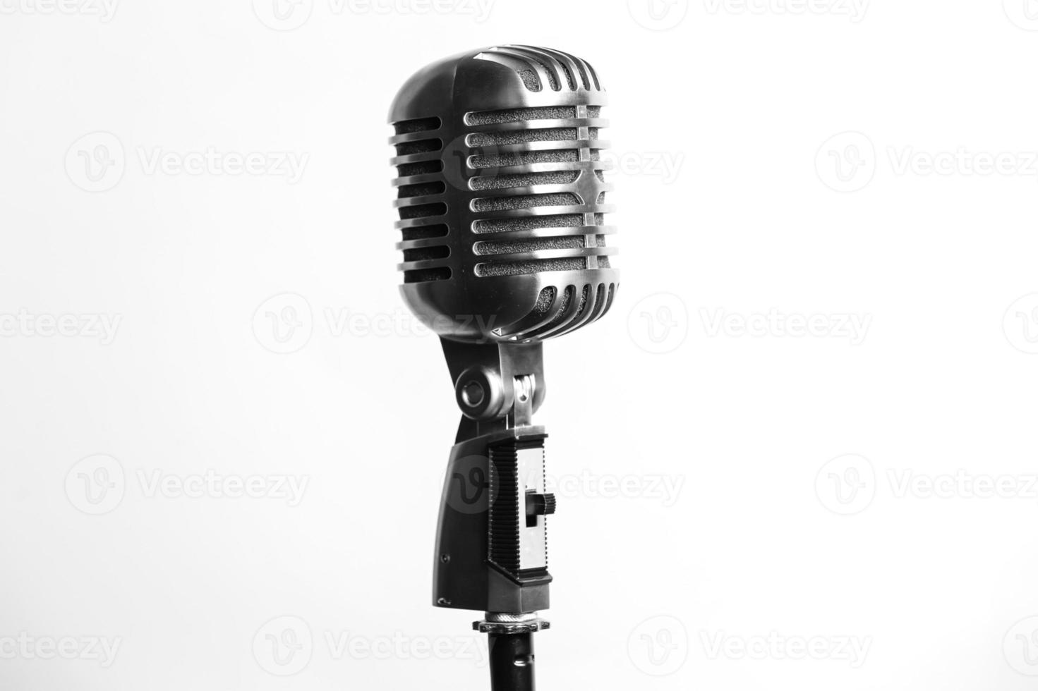 Retro microphone isolated on white background photo