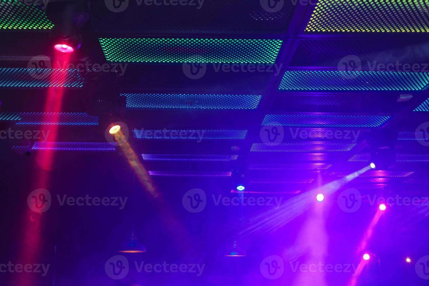 Concert stage. Beautiful Colorful disco lighting in the stage. Performance moving lighting. Concert Light Show. Stage Lights. photo