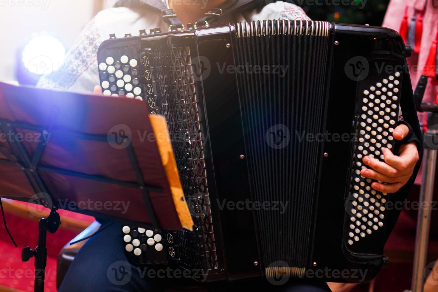Accordion player the musician playing the accordion player instrument photo