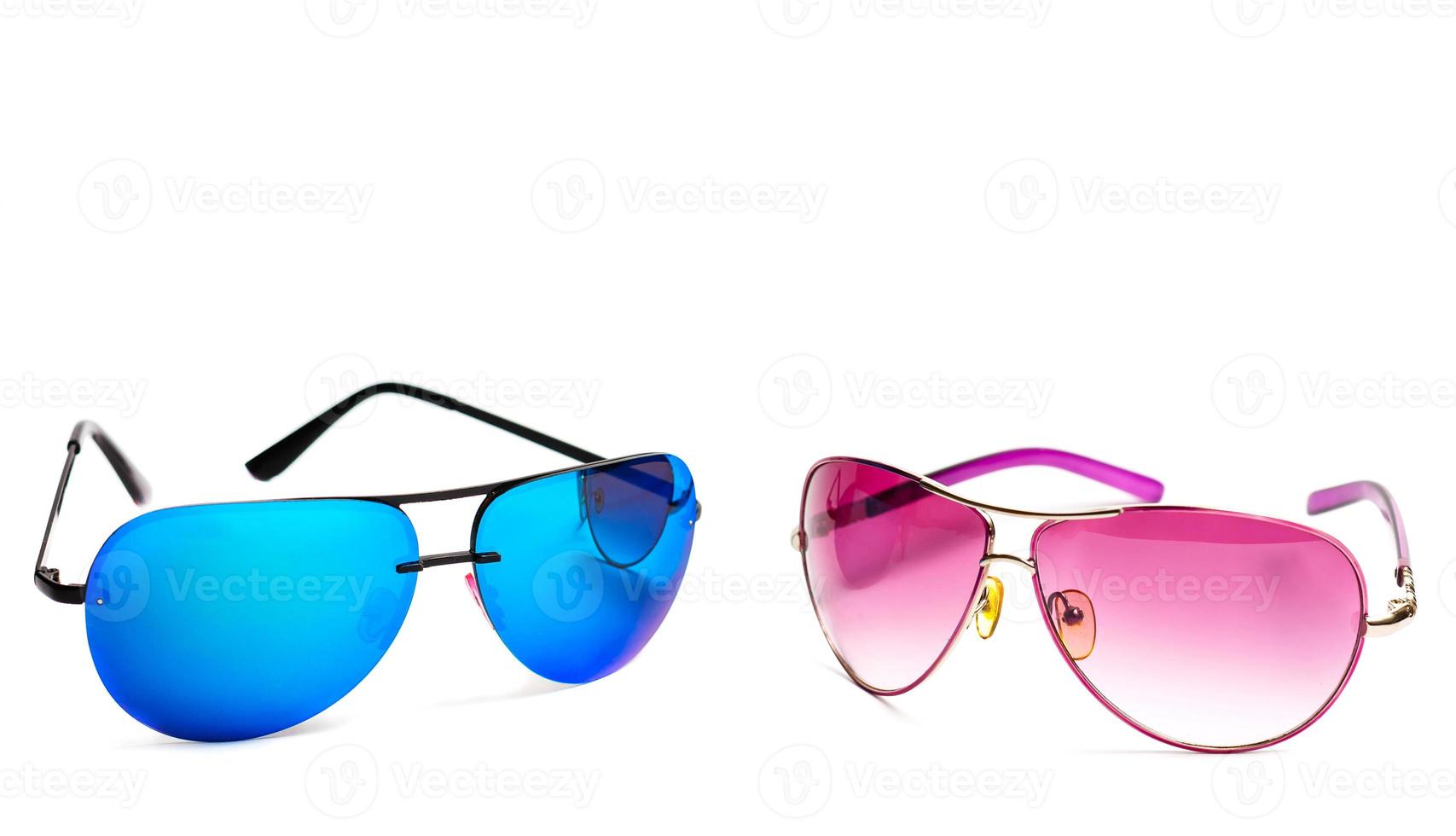 Group of beautiful sunglasses isolated on white background photo