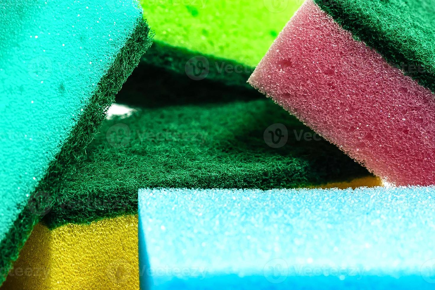 Sponges for dishwashing isolated on a white background photo