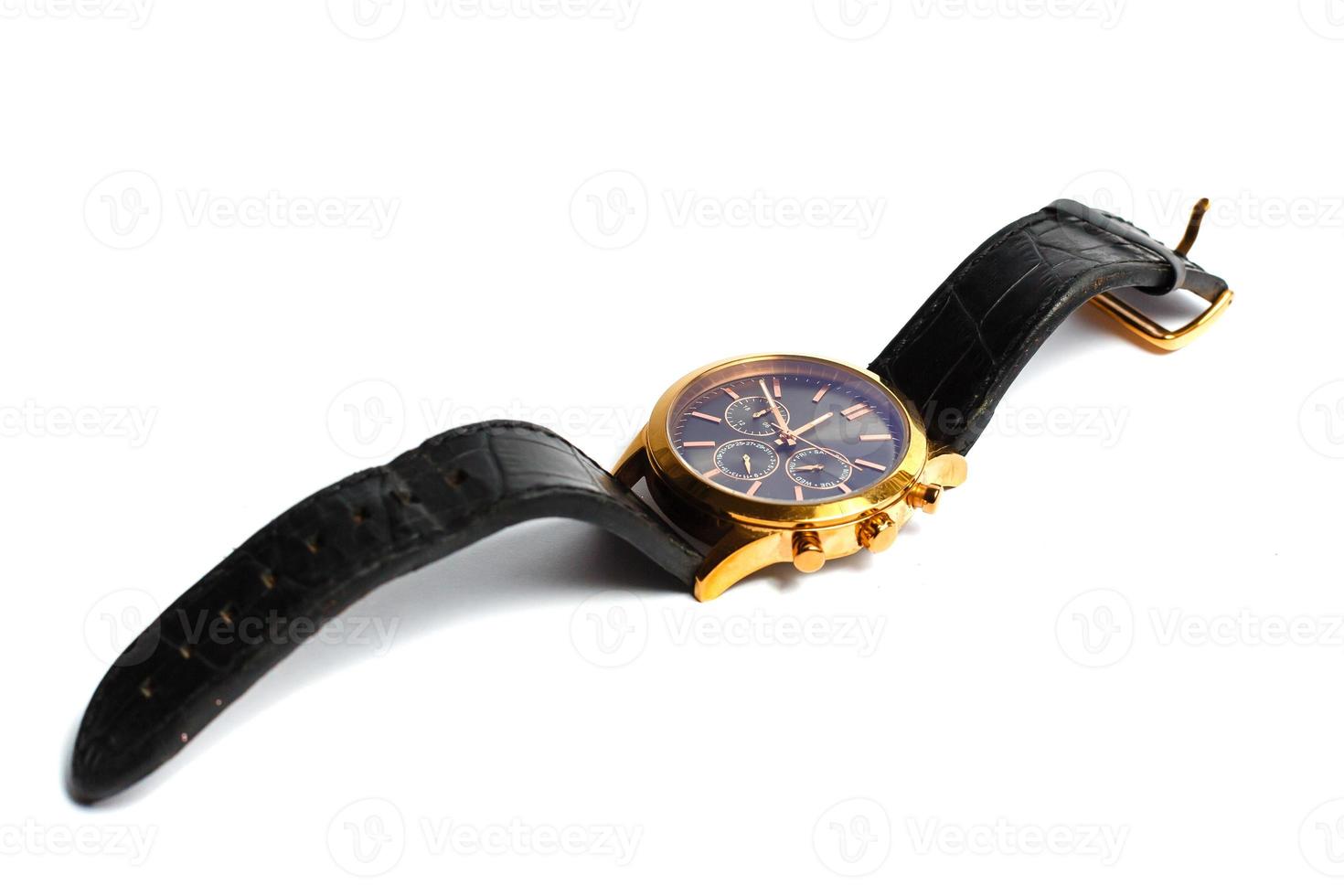 Luxury golden man watch against white background photo