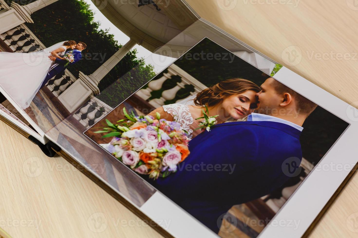 Pages of wedding photobook or wedding album on white background photo