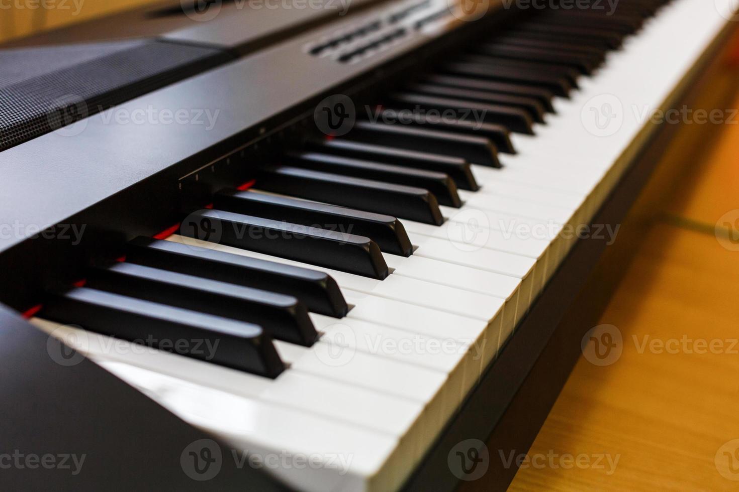 Close up of piano keys close frontal view photo