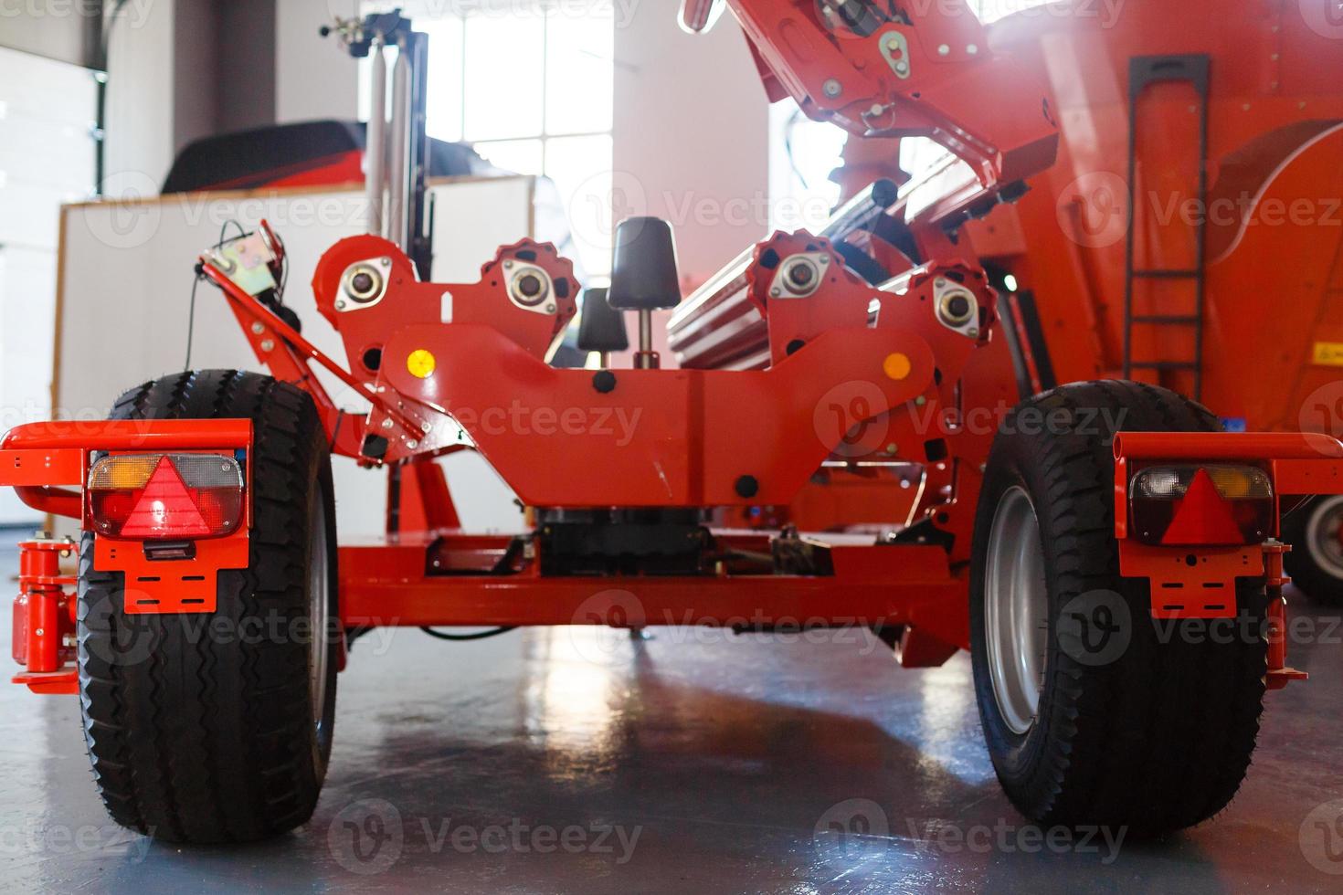 Rear view of modern agricultural tractor hydraulic hitch lifting frame rear mechanism for photo