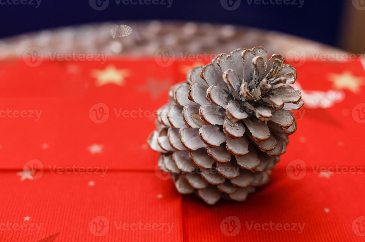 Pine cone with artificial snow for Christmas decoration. photo