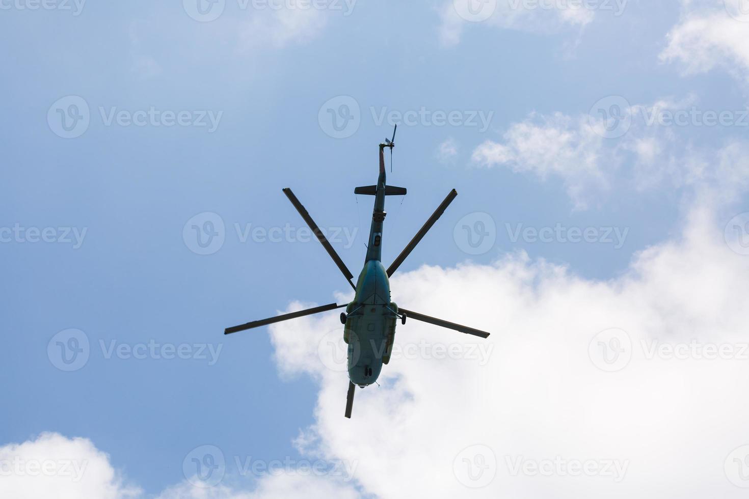 Flying helicopters in the sky. photo