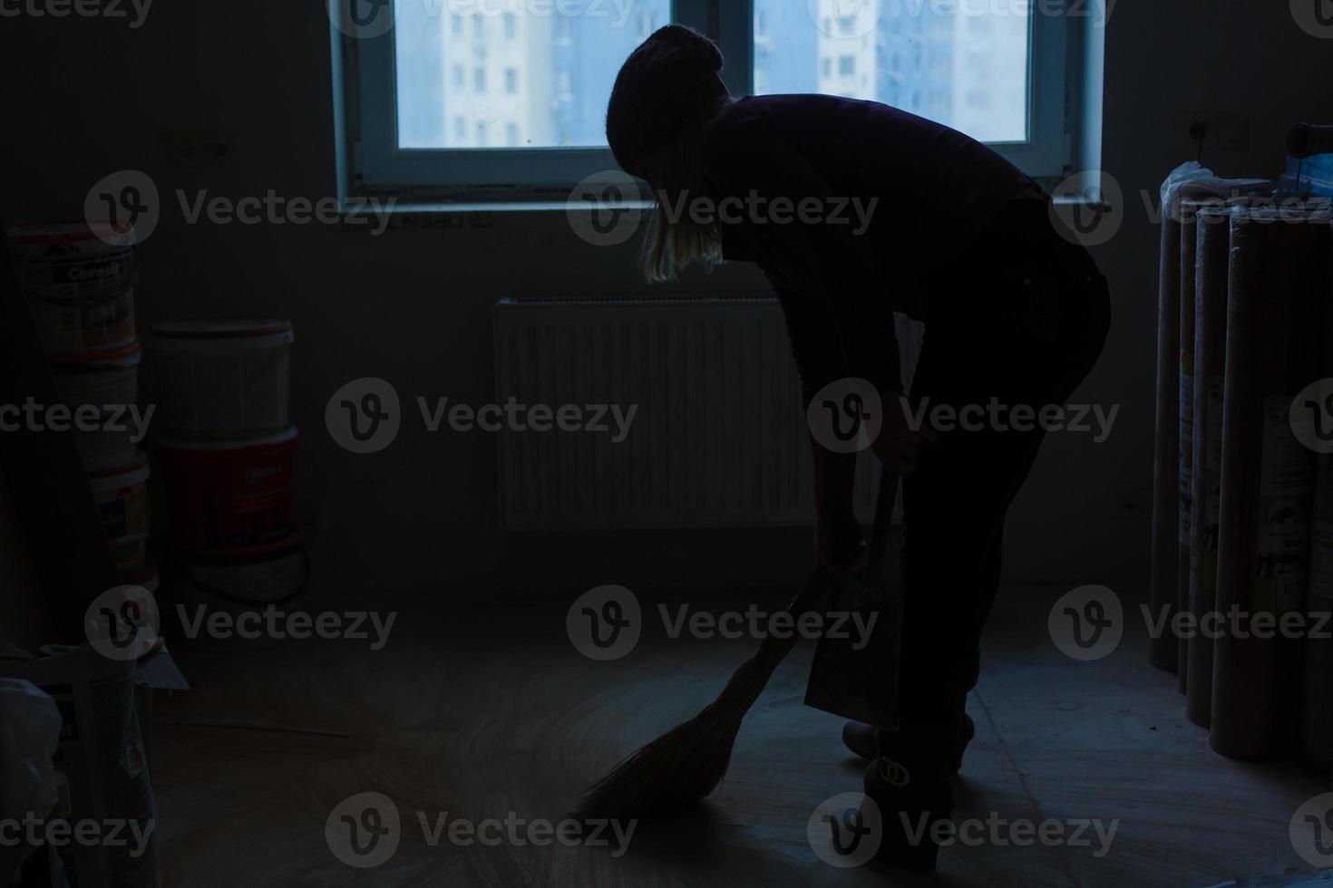 Broom and powder scoop style thai girl sweeping repairs photo