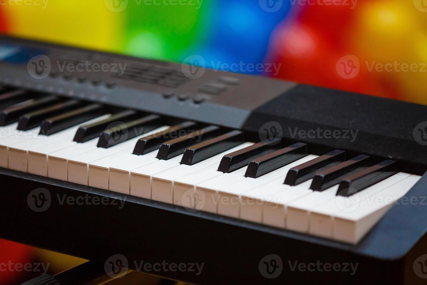 Background of piano keyboard close up electronic piano keys photo