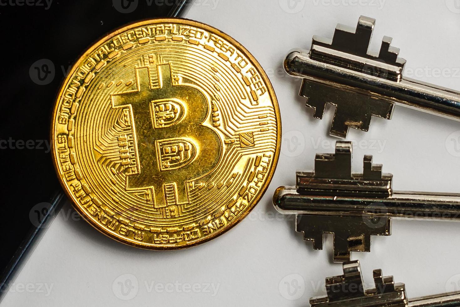 Gold silver bitcoin on the chip with the key crypt of safety virtual money mining security photo