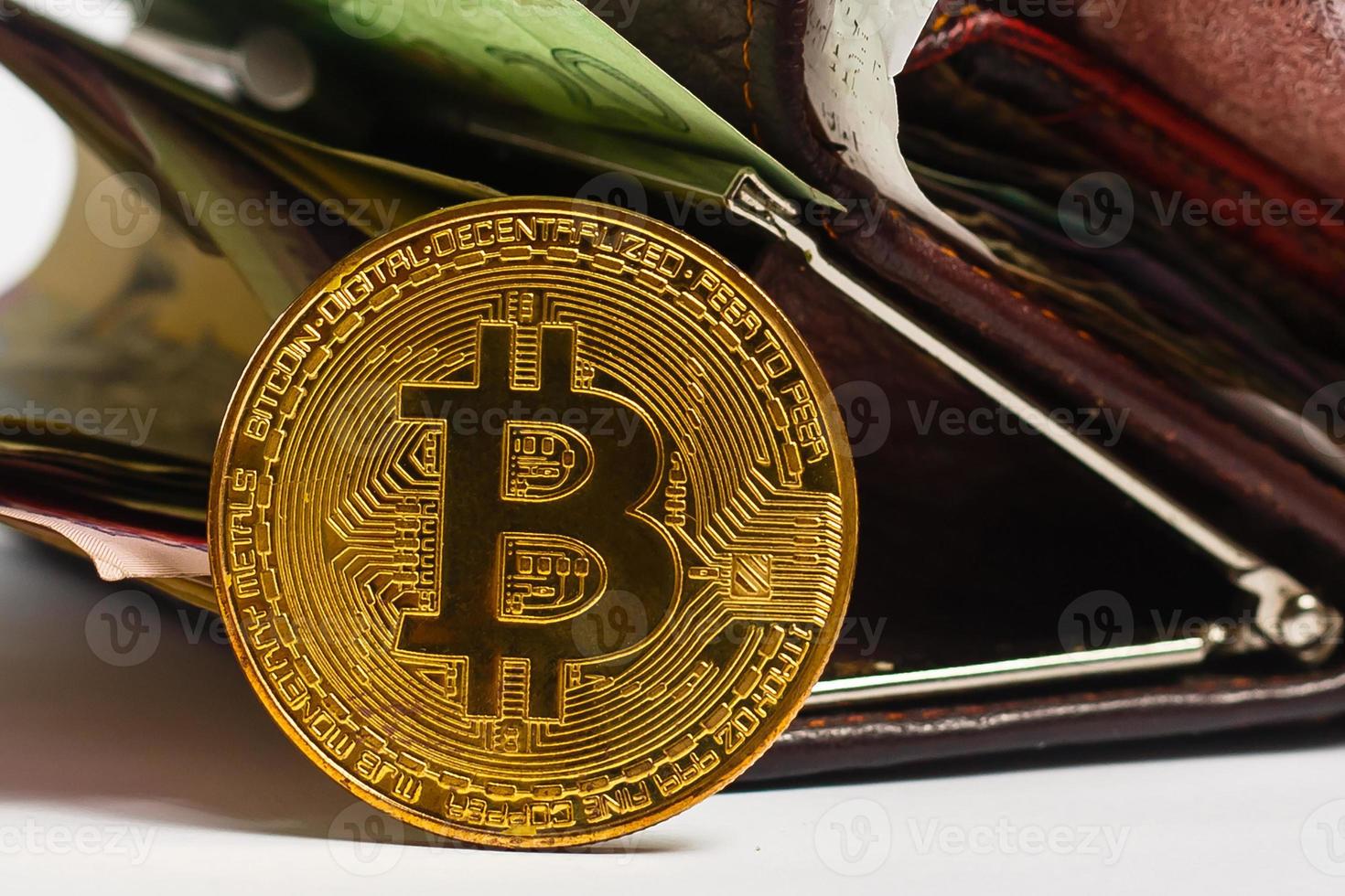 Bitcoin over the ukrainian hryvnia currency photo