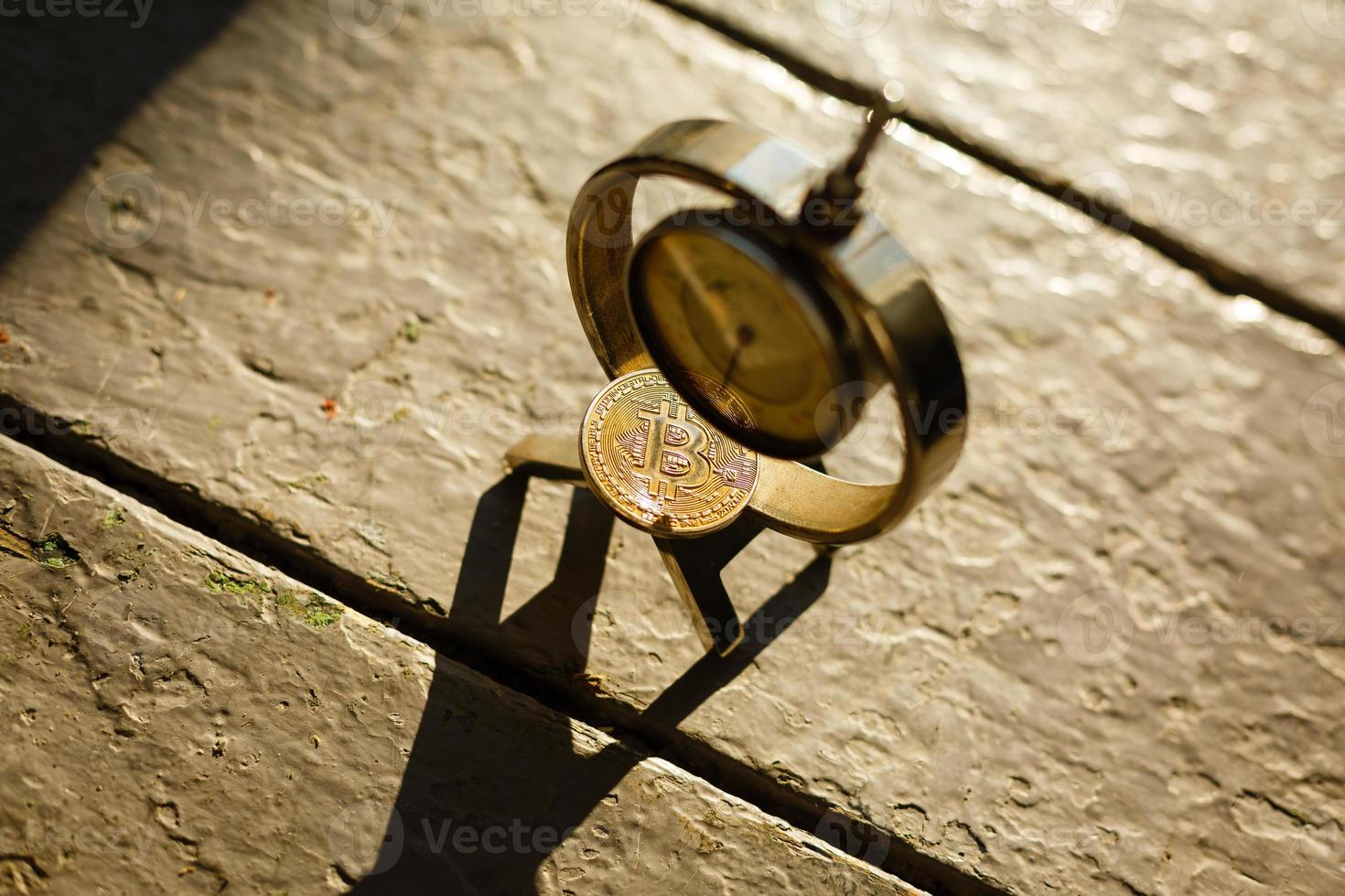 Metal gears wheels with bitcoin on a copper background photo