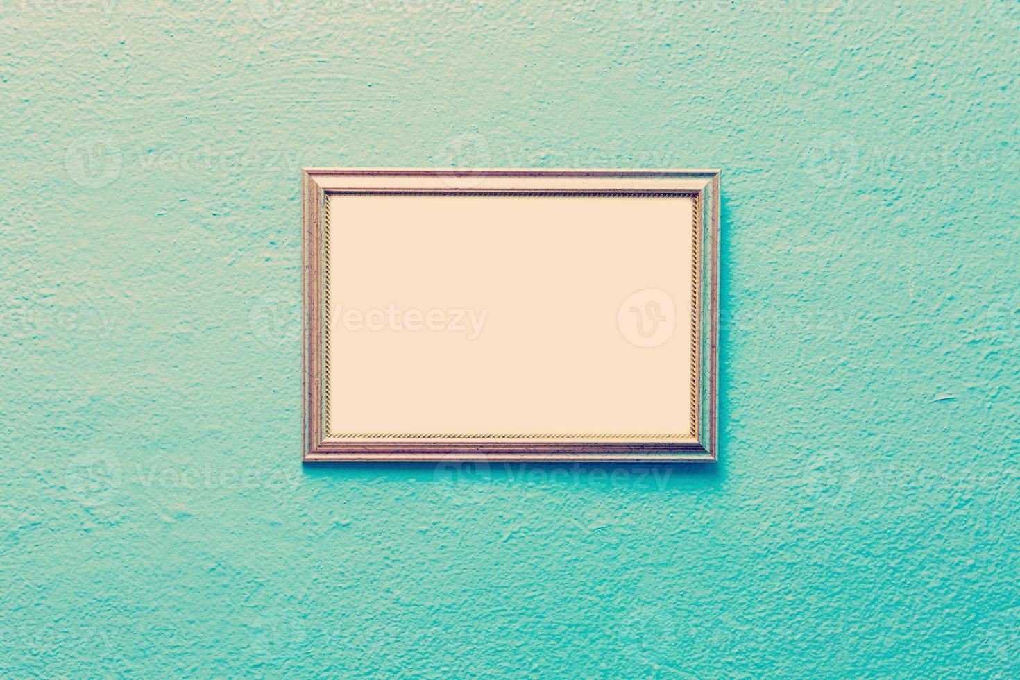 Empty picture frame on a bright solid background photo