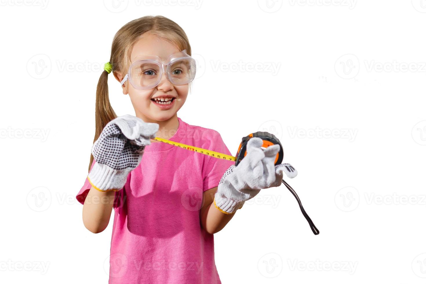 Little girl holding a meter isolated on white background the concept of development of the child photo