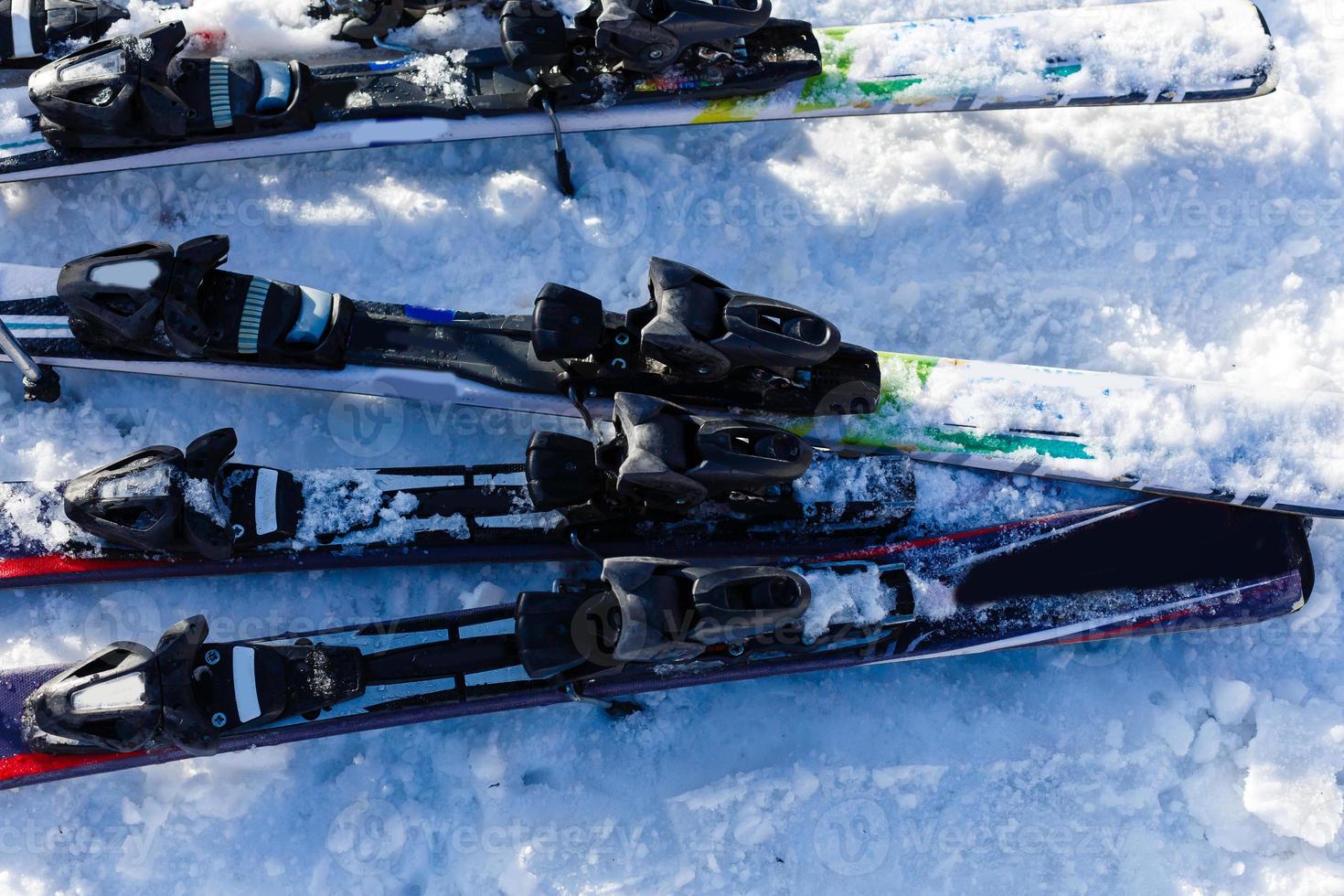 Skiing, winter season , mountains and ski equipments on ski run photo