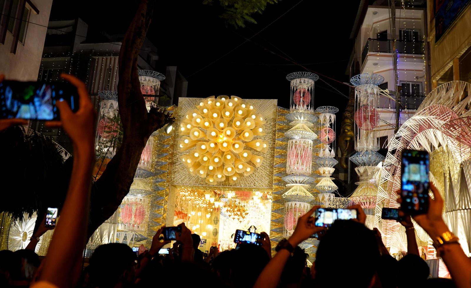 Visitor are busy for capturing the beauty of Mudiali Durga Puja Pandal in their Mobile. 2nd October 2022, Kolkata, West Bengal, India. photo