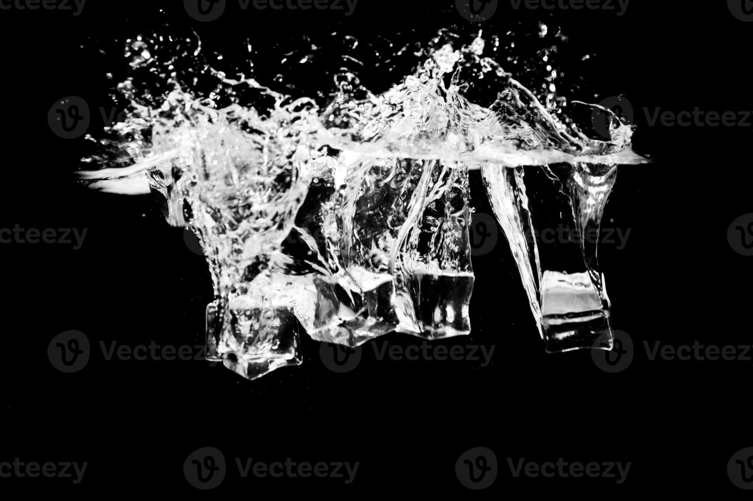 ice cubes on a black background photo