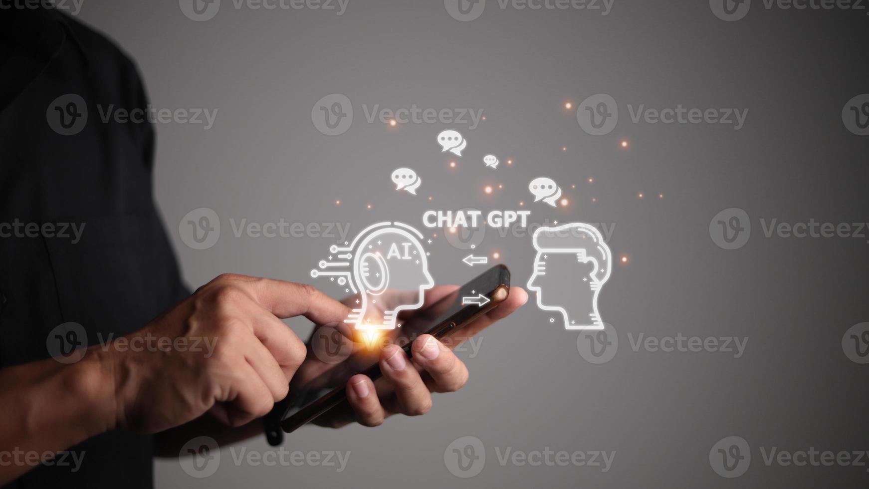 ChatGPT Chat with AI or Artificial Intelligence. man chatting with a smart AI or artificial intelligence using an artificial intelligence chatbot developed by OpenAI. photo