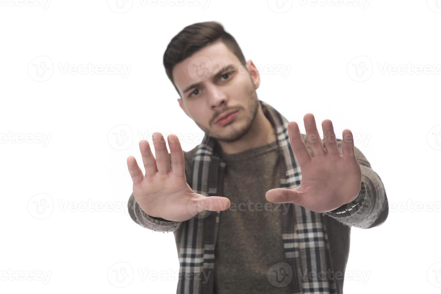 man happy smile standing hand pointing to empty space on white background. photo