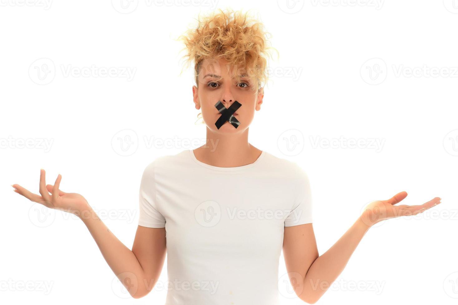 young attractive woman with mouth and lips sealed photo