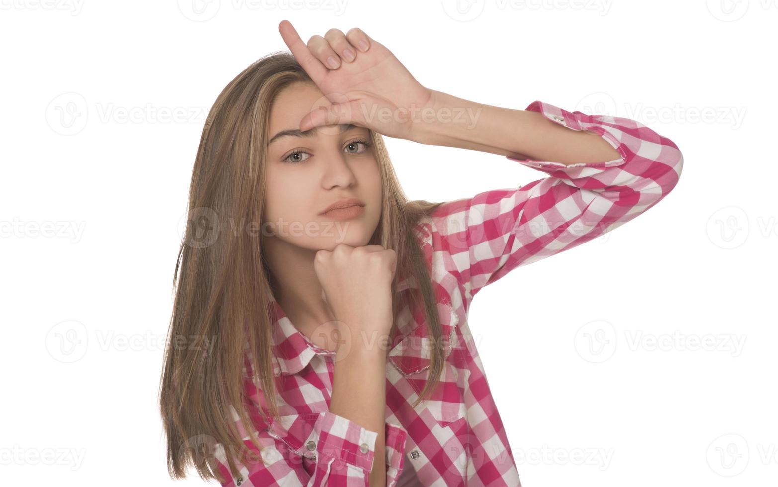 young woman looking amazed posing isolated on white background photo