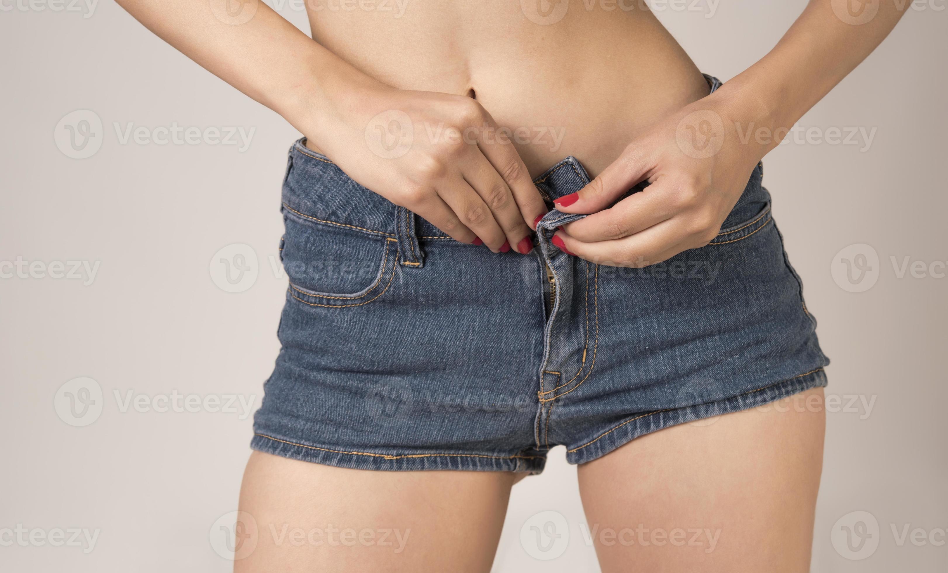 Sexy woman in fashion blue jeans shorts. Perfect hot booty and erotic  curves hips. Good body shapes whithout cellulite. Sport and diet. 17466686  Stock Photo at Vecteezy