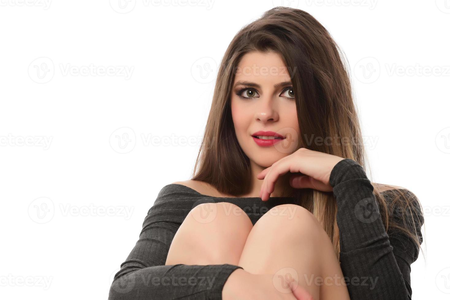 Young woman standing pose with everyday gestural movements, isolated on studio background. photo