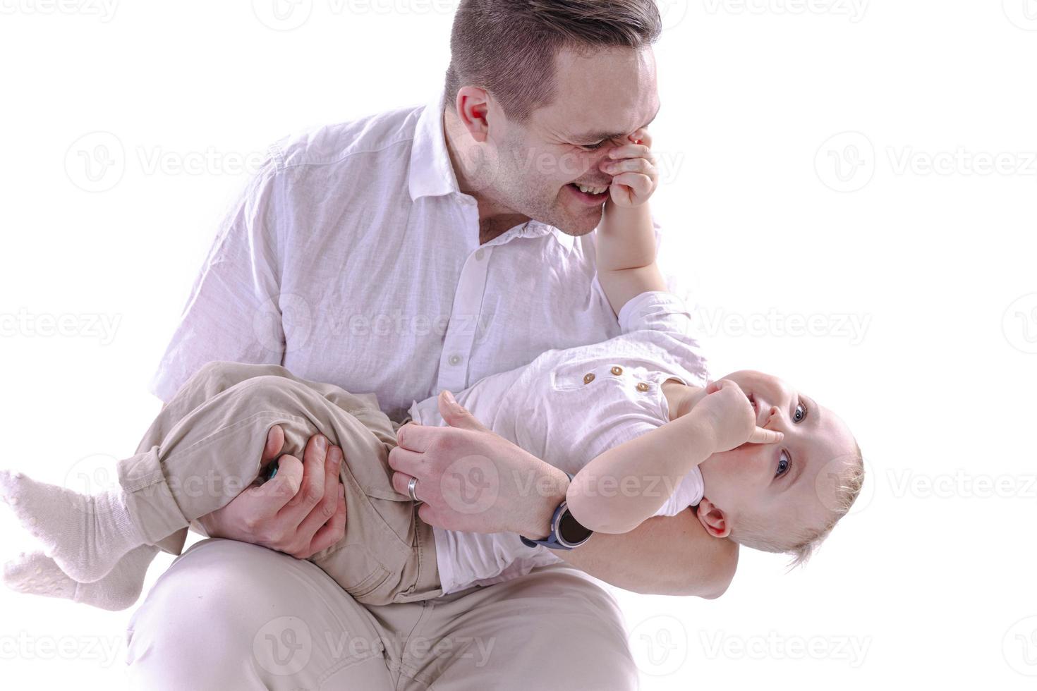 Dad and son are playing and fooling around. photo