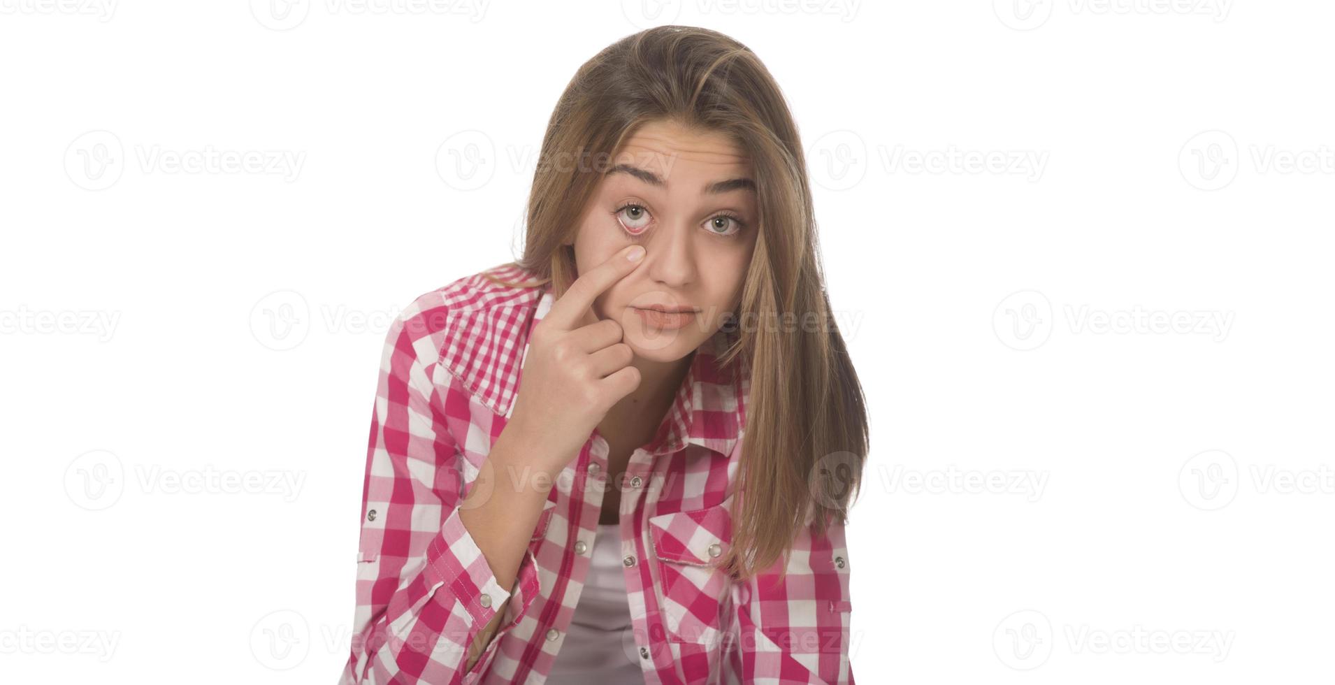 young woman with opened mouth looking amazed photo