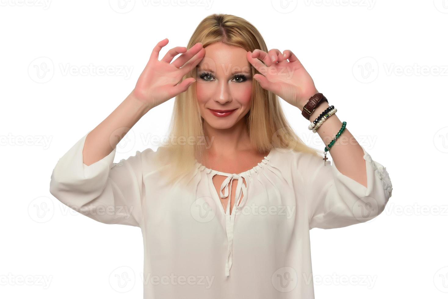 Female making can't hear you gesture isolated on white background photo