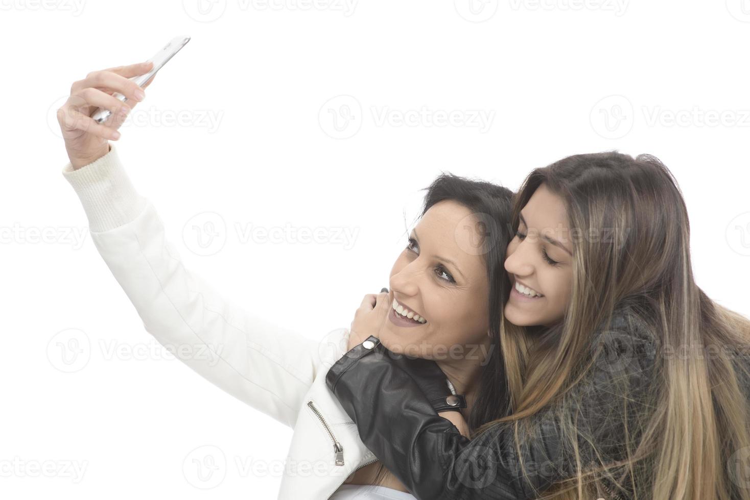 attractive and smiling friends taking selfie photo