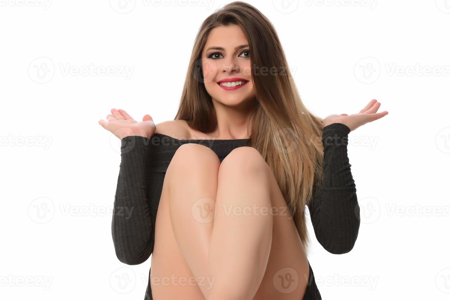 Young woman standing pose with everyday gestural movements, isolated on studio background. photo