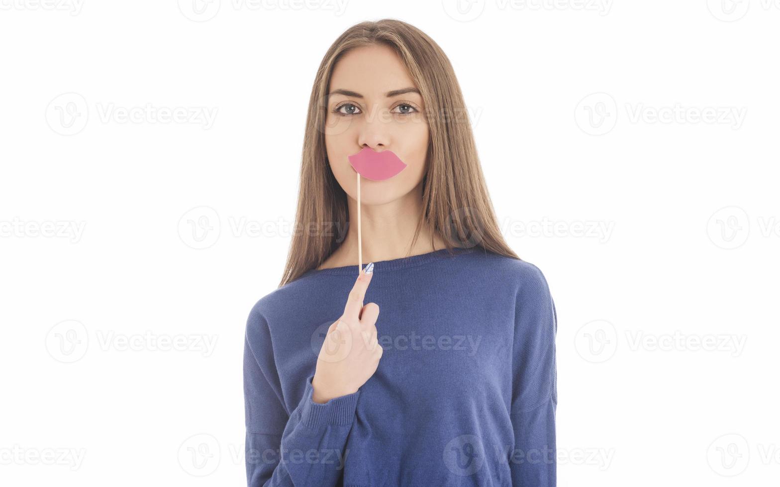 funny female model over white background crosses eyes and makes fish lips funny grimace photo