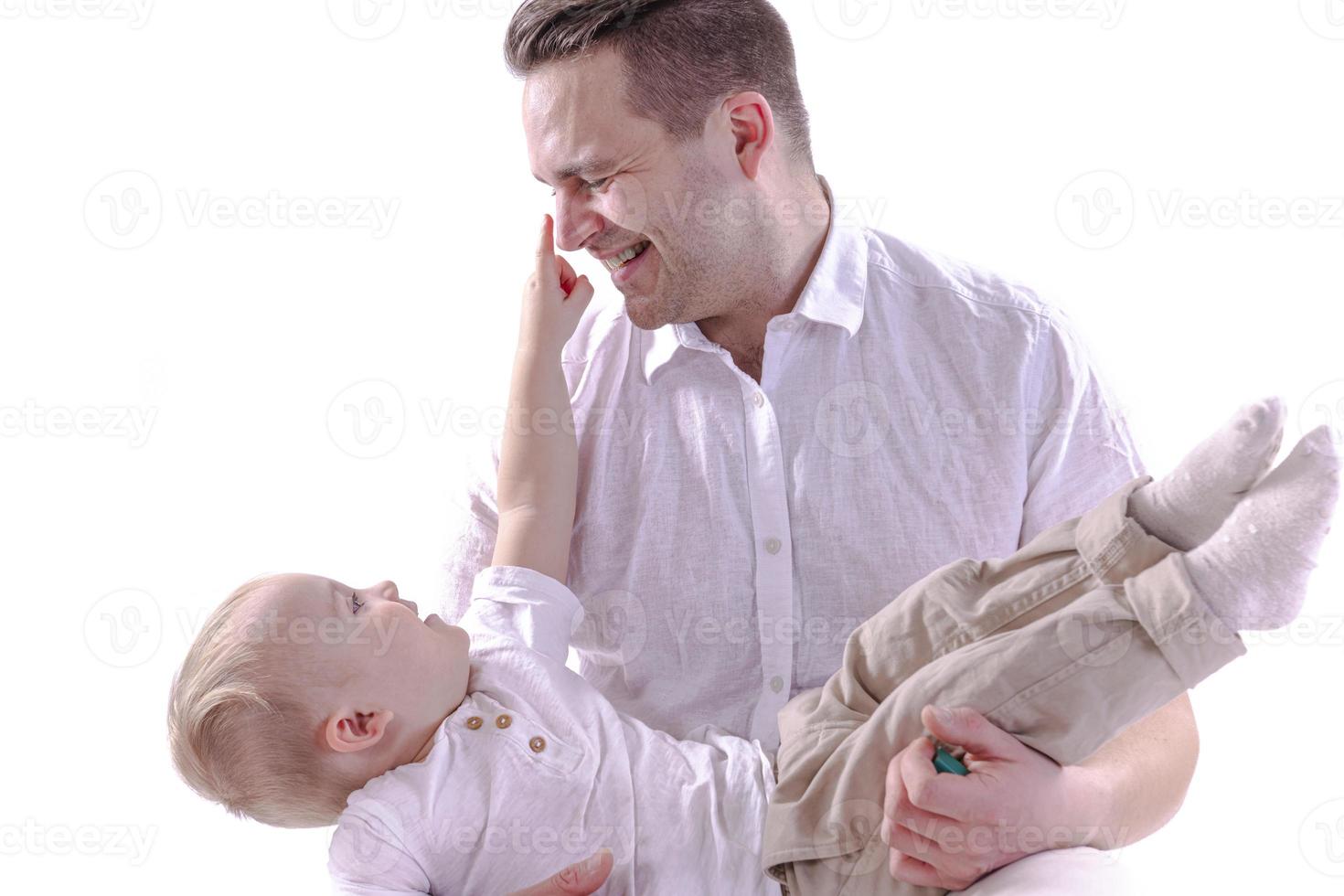 Dad and son are playing and fooling around. photo