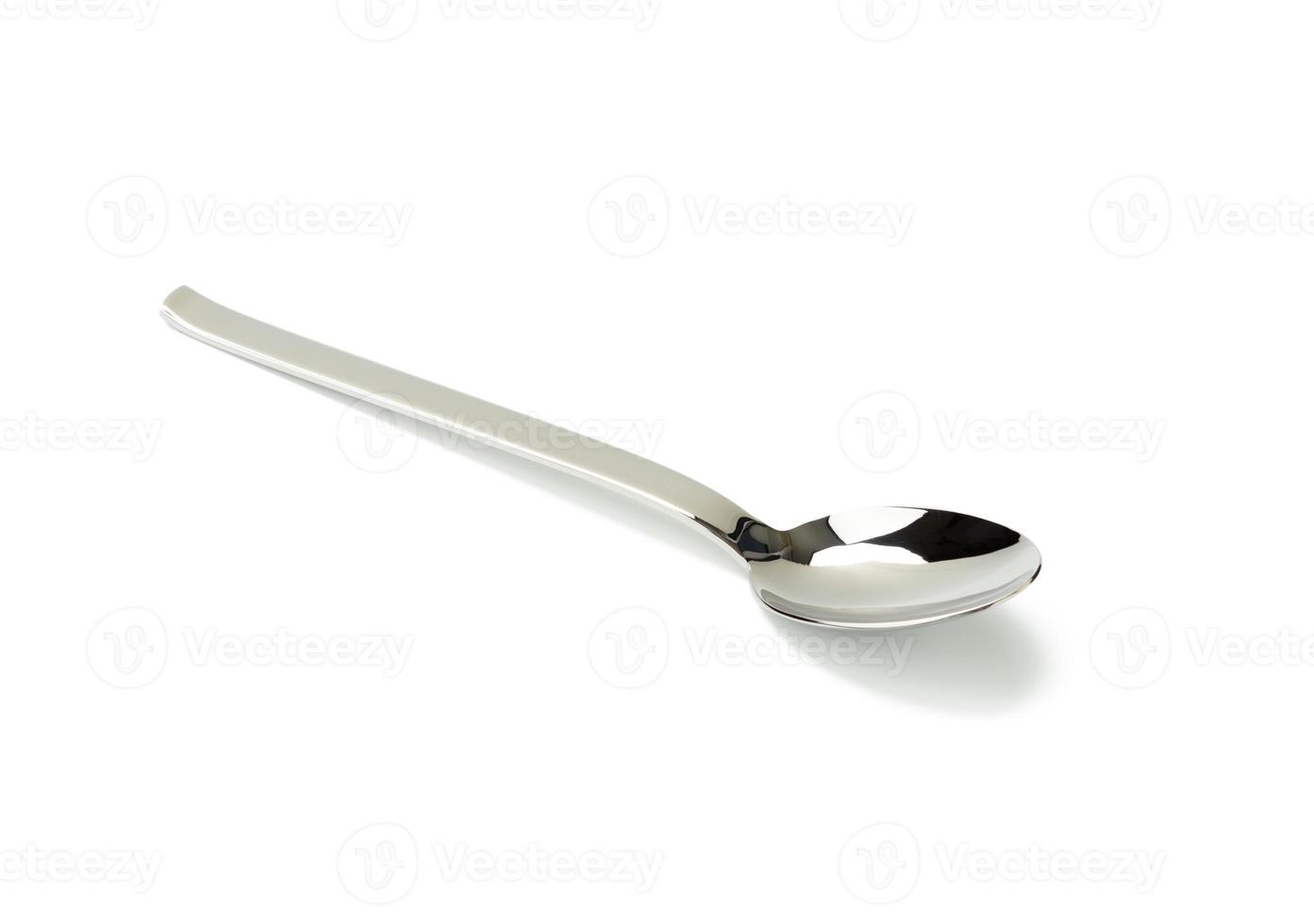 large metal soup spoon isolated on white background photo