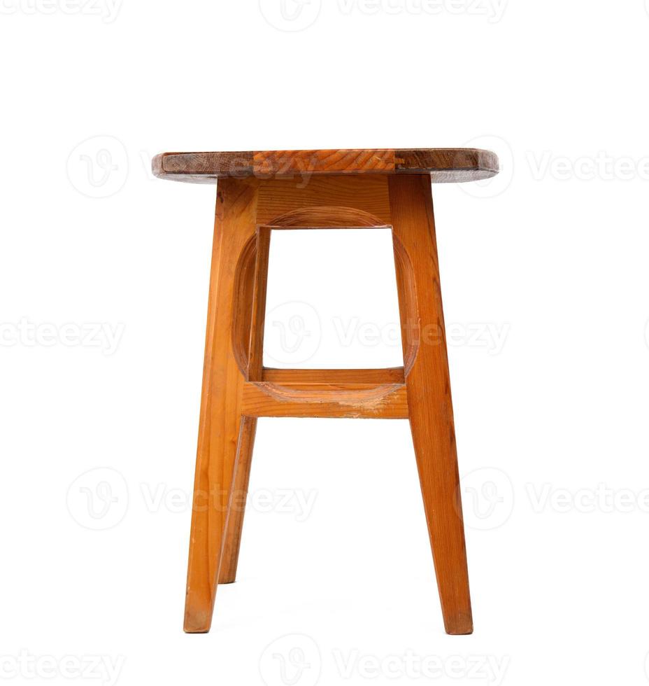 wooden kitchen stool with legs isolated on white background photo