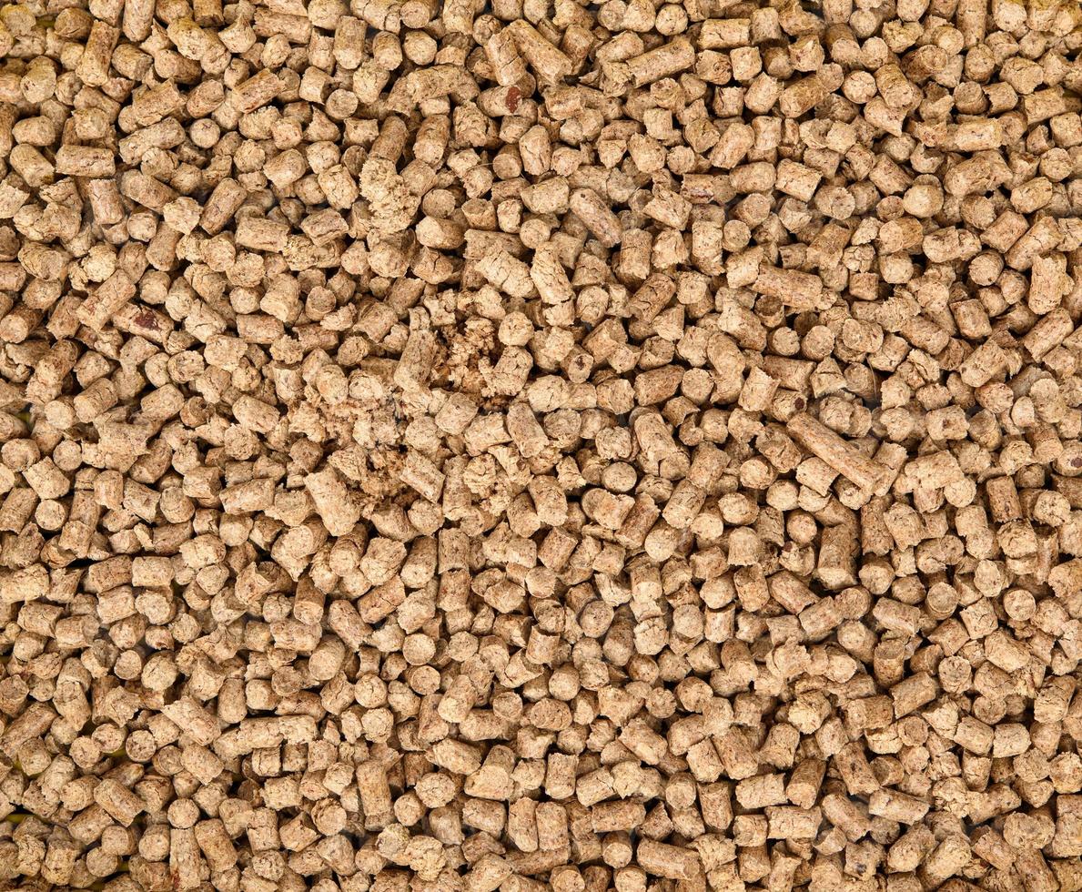 pressed sawdust, ecological filler for animal litter photo