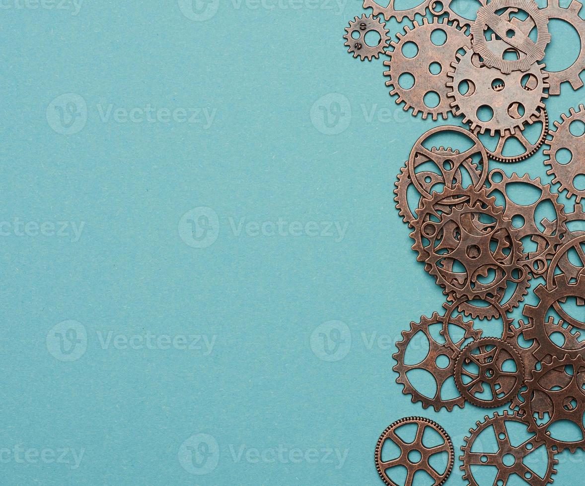 copper various cogs on a blue background photo