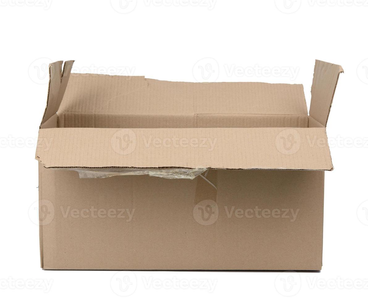open cardboard rectangular box made of corrugated brown paper photo